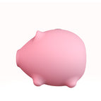 Piglet sucks on a pink vibrating egg